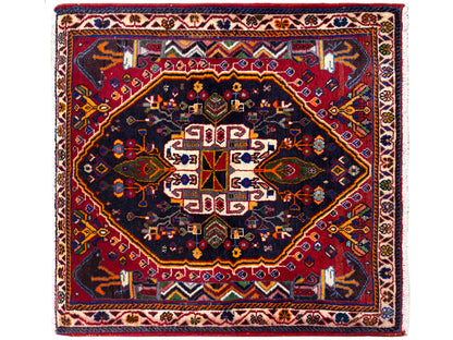 Square rug with a dark blue background, red border, and centered ornament, 70x67 cm
