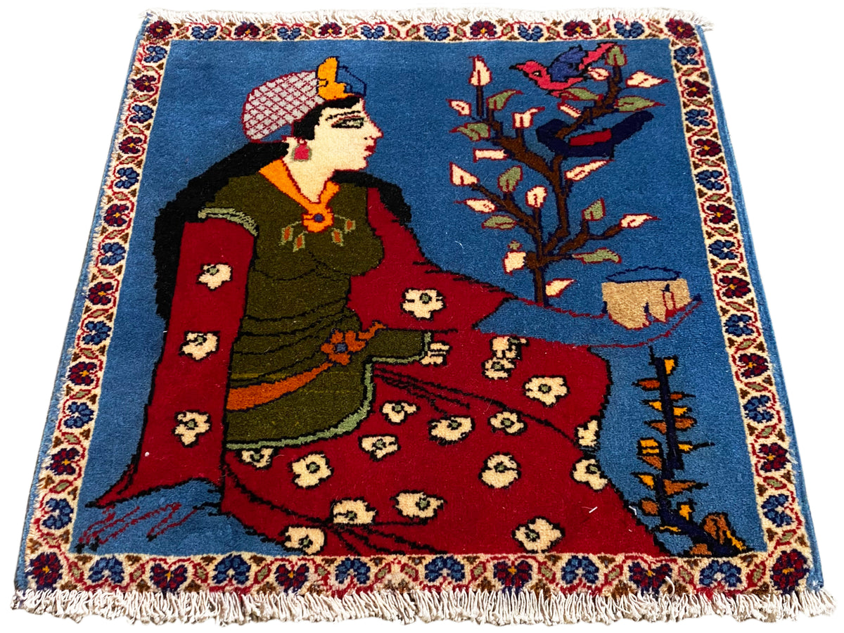 Poshti rug 65x63 cm with fairytale motif, blue area, red center section and fringes