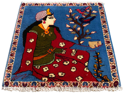 Poshti rug 65x63 cm with fairytale motif, blue area, red center section and fringes
