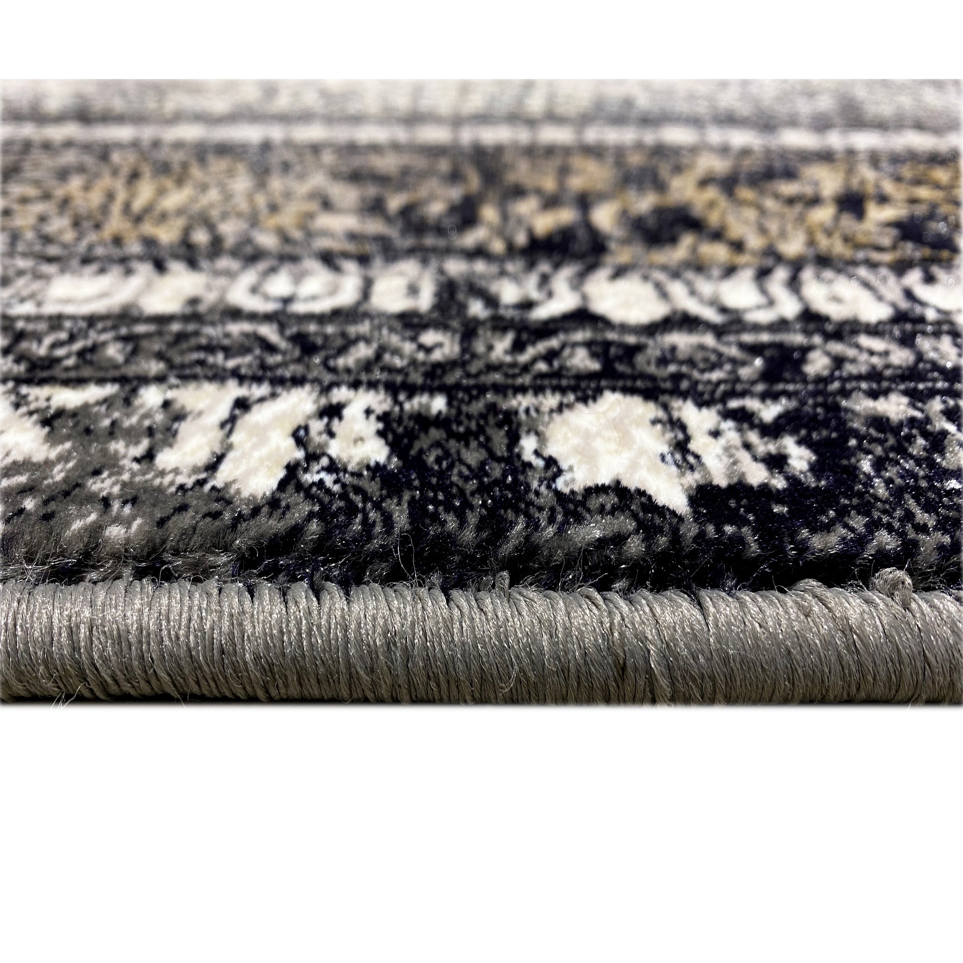 Polypropylen Flächenteppich, kompliziertes Zentral-Medaillon, Schwarz- und Grautöne, luxuriöser Stil.