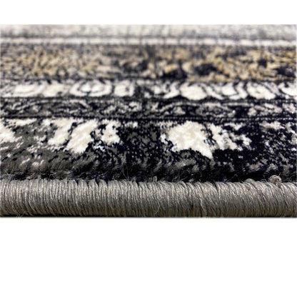 Polypropylen Flächenteppich, kompliziertes Zentral-Medaillon, Schwarz- und Grautöne, luxuriöser Stil.