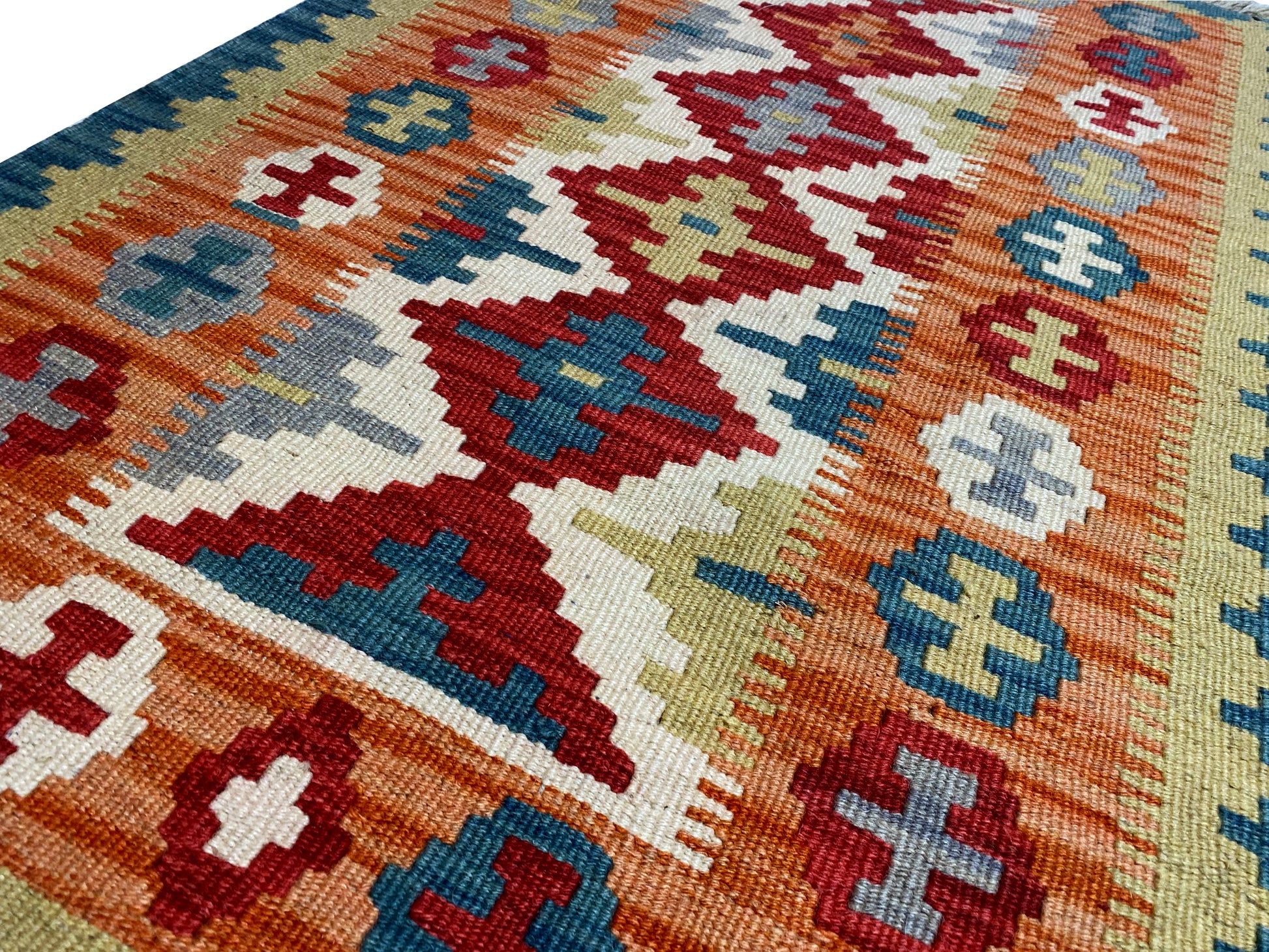 Boho Kelim Teppich 120x80 cm Blau mit warmen Rot- und Ockertönen